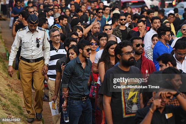 People standing in long queue to enter for the Global Citizen India event at MMRDA Ground, BKC, on November 19, 2016 in Mumbai, India. Coldplay's...