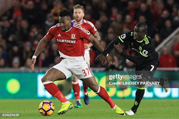 Middlesbrough's Spanish midfielder Adama Traore vies with Chelsea's French midfielder N'Golo Kante during the English Premier League football match...