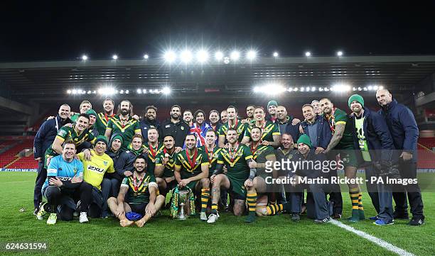 Australia players and staff pose for a photograph with the trophy after the Final of the Ladbrokes Four Nations Championship at Anfield, Liverpool.
