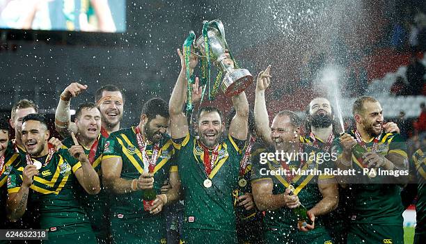 Australia's Cameron Smith lifts the trophy with his team-mates after the Final of the Ladbrokes Four Nations Championship at Anfield, Liverpool.