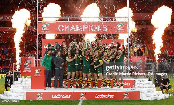 Australia's Cameron Smith lifts the trophy with his team-mates after the Final of the Ladbrokes Four Nations Championship at Anfield, Liverpool.