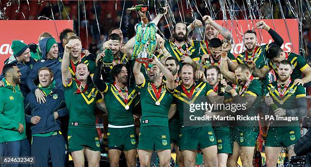 Australia's Cameron Smith lifts the trophy with his team-mates after the Final of the Ladbrokes Four Nations Championship at Anfield, Liverpool.