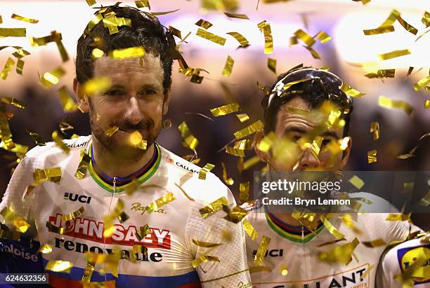 Sir Bradley Wiggins and Mark Cavendish of Great Britain and Team John Saey - Callant celebrate victory after the final day of the 76th 6 Days of Gent...