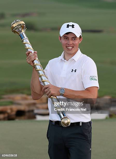 Matt Fitzpatrick of England poses with the trophy following his victory during day four of the DP World Tour Championship on the at Jumeirah Golf...