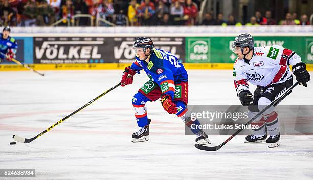 Drayson Bowman of Duesseldorf and Shawn Lalonde of Koeln in action during the DEL match between Duesseldorfer EG and Koelner Haie at ISS Dome on...