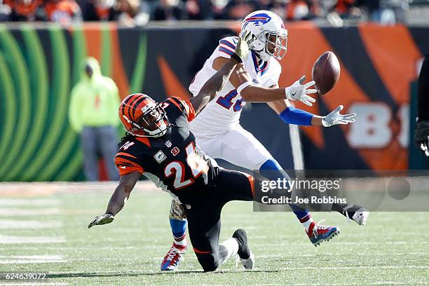 Robert Woods of the Buffalo Bills catches the ball after it was tipped by Adam Jones of the Cincinnati Bengals during the first quarter at Paul Brown...