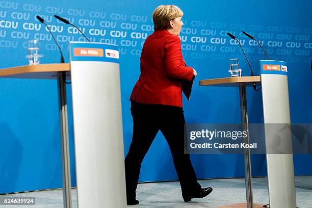 German Chancellor and Chairwoman of the German Christian Democrats Angela Merkel leave a press conference following meetings of the CDU leadership...