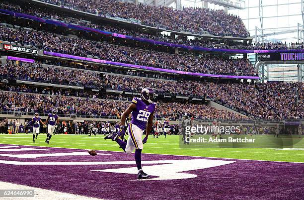 Xavier Rhodes of the Minnesota Vikings celebrates a touchdown after a 100 yard interception return in the second quarter of the game against the...