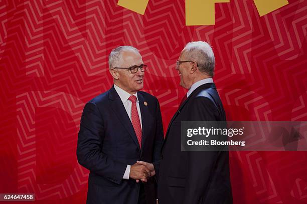 Pedro Pablo Kuczynski, Peru's president, right, greets Malcolm Turnbull, Australia's prime minister, during the Asia-Pacific Economic Cooperation...