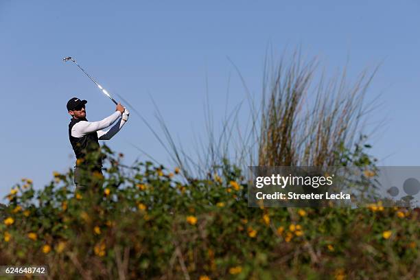 Patrick Rodgers of the United States plays his tee shot on the 8th hole during the final round of the RSM Classic at Sea Island Resort Seaside Course...