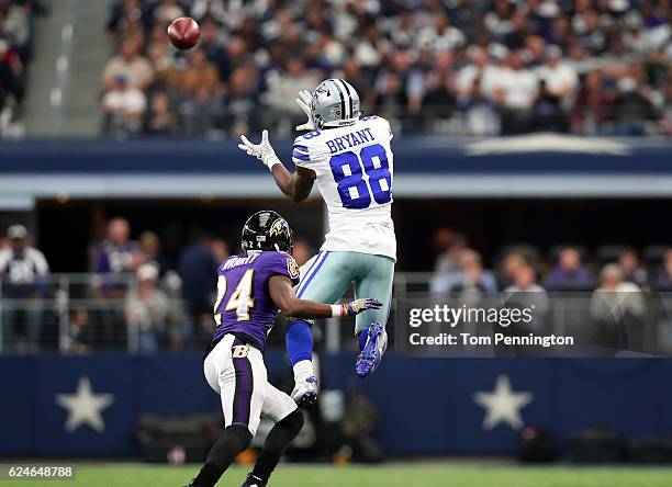 Dez Bryant catches a pass from Dak Prescott of the Dallas Cowboys during the second quarter against the Baltimore Ravens at AT&T Stadium on November...