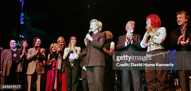 Former First Lady Hillary Clinton surrounded by family and celebrities during her 53rd birthday celebration at the Rosebud Club in New York City on...