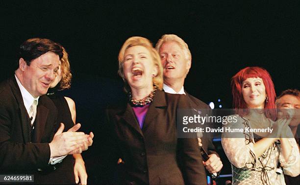 Former First Lady Hillary Clinton surrounded by family and celebrities during her 53rd birthday celebration at the Rosebud Club in New York City on...