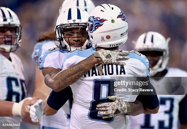 Tajae Sharpe of the Tennessee Titans and Marcus Mariota of the Tennessee Titans celebrate after a Titans touchdown in the third quarter of the game...