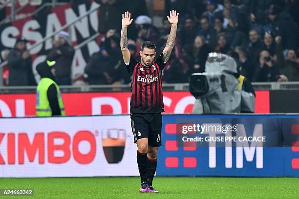 Milan's forward from Spain Suso celebrates after scoring a goal during the Italian Serie A football match AC Milan vs Inter Milan at "San Siro"...