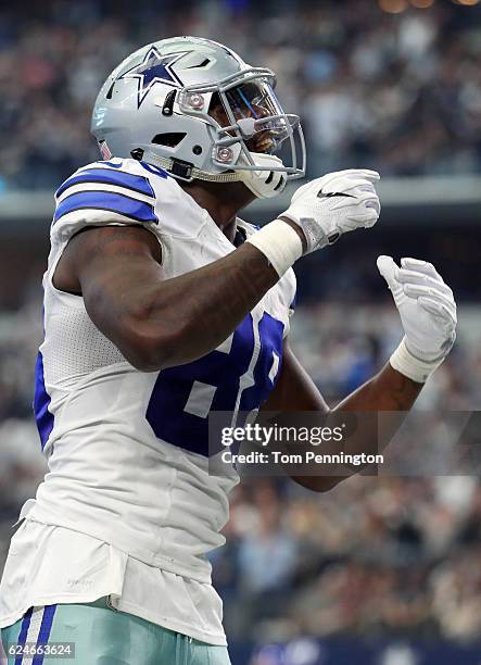 Dez Bryant of the Dallas Cowboys celebrates after scoring a touchdown after catching a pass from Dak Prescott during the third quarter against the...