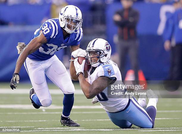 Rishard Matthews of the Tennessee Titans makes a catch while being guarded by Rashaan Melvin of the Indianapolis Colts during the second half of the...