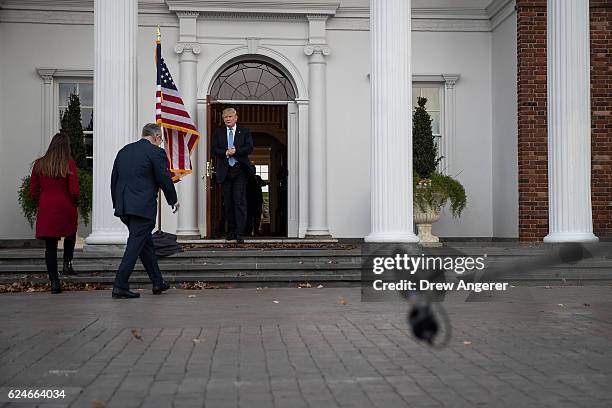 Former New York City mayor Rudy Giuliani arrives for his meeting with president-elect Donald Trump at Trump International Golf Club, November 20,...