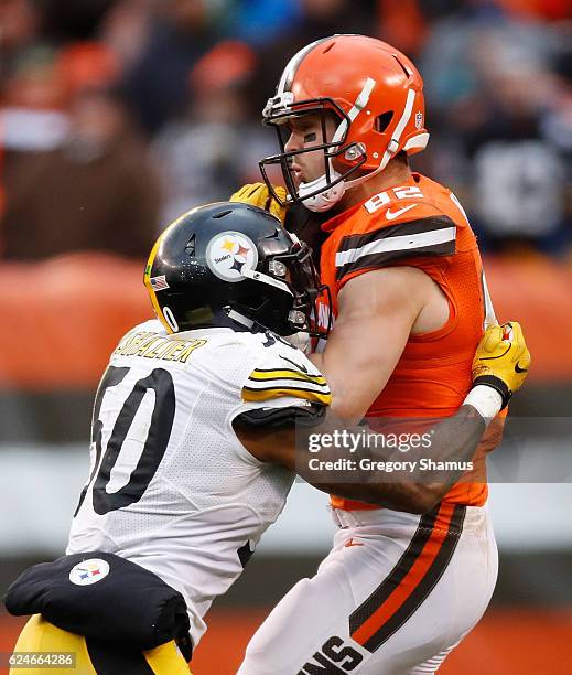 Gary Barnidge of the Cleveland Browns is tackled by Ryan Shazier of the Pittsburgh Steelers during the fourth quarter at FirstEnergy Stadium on...