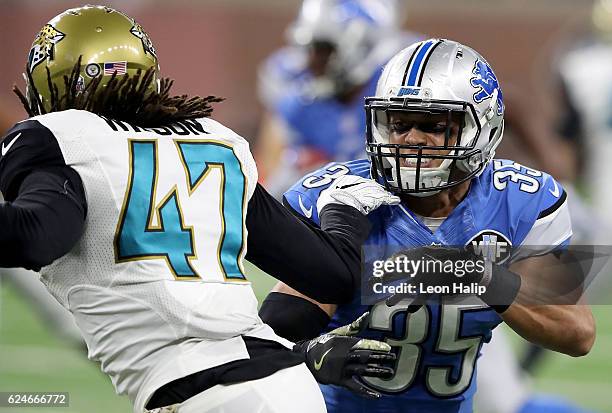 Miles Killebrew of the Detroit Lions faces off against Jarrod Wilson of the Jacksonville Jaguars during first half action at Ford Field on November...