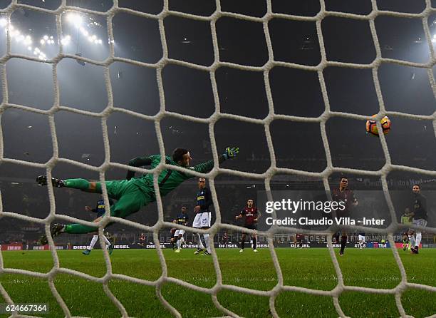 Fernandez Suso of AC Milan scores the opening goal during the Serie A match between AC Milan and FC Internazionale at Stadio Giuseppe Meazza on...