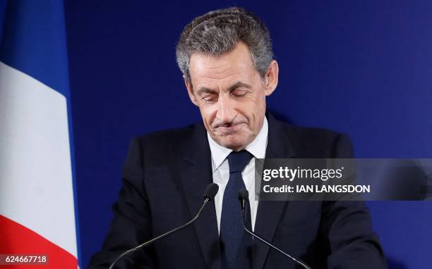 Former French President and candidate for the French right-wing presidential primary Nicolas Sarkozy delivers a speech at his campaign headquarters...