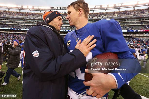 Jay Cutler of the Chicago Bears shakes hands with Eli Manning after they lost to the New York Giants 22-16during the second half at MetLife Stadium...