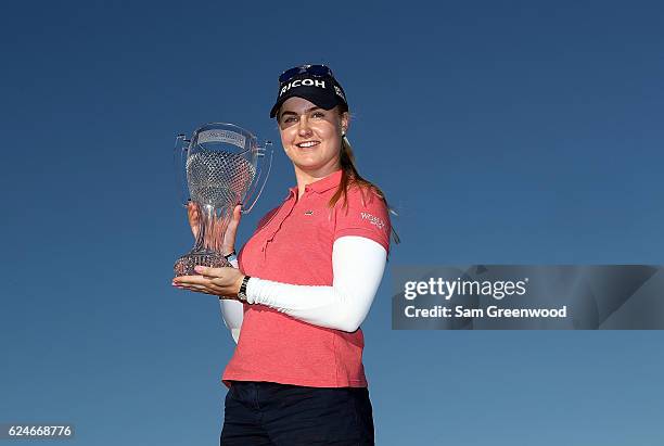 Charley Hull of England poses with the CME Tour Championship trophy during the final round of the CME Group Tour Championship at Tiburon Golf Club on...