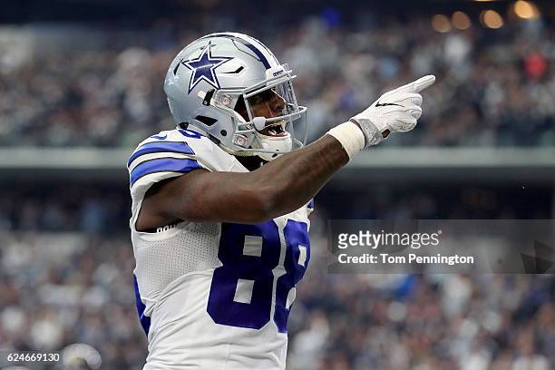 Dez Bryant of the Dallas Cowboys celebrates after scoring a touchdown against the Baltimore Ravens in the fourth quarter at AT&T Stadium on November...