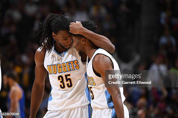 Kenneth Faried of the Denver Nuggets talks with Will Barton of the Denver Nuggets during the game against the Golden State Warriors on November 10,...