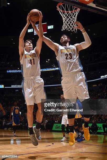 Juancho Hernangomez and Jusuf Nurkic of the Denver Nuggets go for the rebound during the game against the Golden State Warriors on November 10, 2016...