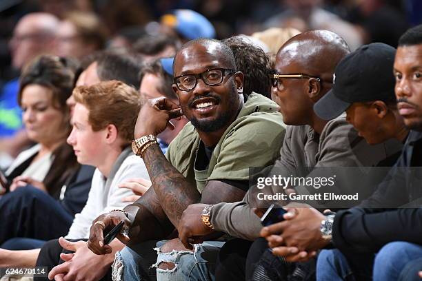 Football player, Von Miller of the Denver Broncos watches the game between the Denver Nuggets and the Golden State Warriors on November 10, 2016 at...