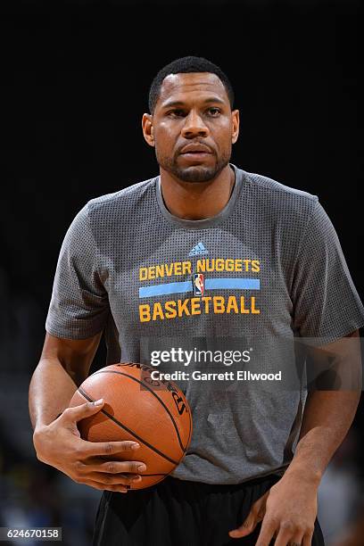 Malik Beasley of the Denver Nuggets warms up before the game against the Golden State Warriors on November 10, 2016 at the Pepsi Center in Denver,...