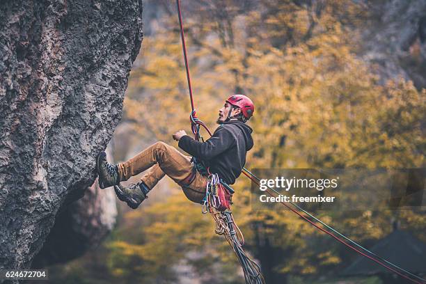 time to go down - crag stock pictures, royalty-free photos & images