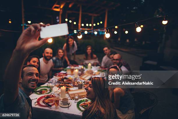 friends in a local bistro - evening meal restaurant stock pictures, royalty-free photos & images