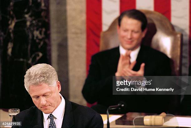 Vice President Al Gore listens to President Bill Clinton during the State of the Union speech before a joint session of Congress on January 20, 1999.