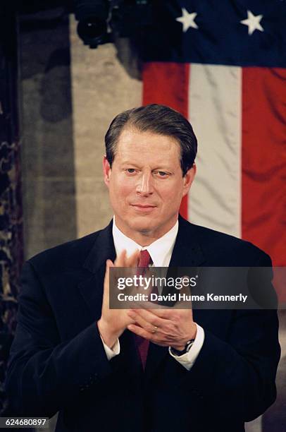 Vice President Al Gore applauds during the President Bill Clinton's State of the Union speech before a joint session of Congress on January 20, 1999.