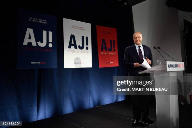 Candidate for the French right-wing presidential primary Alain Juppe delivers a speech at his campaign headquarters after the vote's first round, on...