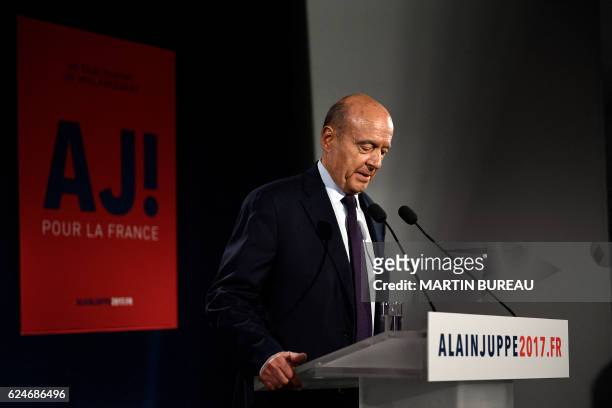 Candidate for the French right-wing presidential primary Alain Juppe delivers a speech at his campaign headquarters after the vote's first round, on...