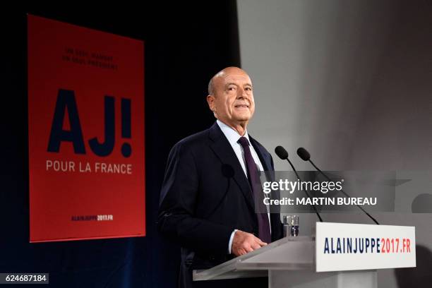 Candidate for the French right-wing presidential primary Alain Juppe delivers a speech at his campaign headquarters after the vote's first round, on...