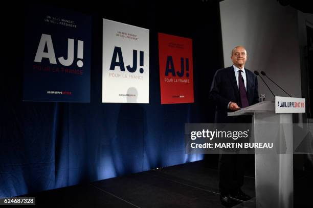 Candidate for the French right-wing presidential primary Alain Juppe delivers a speech at his campaign headquarters after the vote's first round, on...
