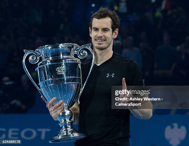 Andy Murray of Great Britain celebrates with the World Number One trophy after his victory over Novak Djokovic of Serbia in their mens singles Final...