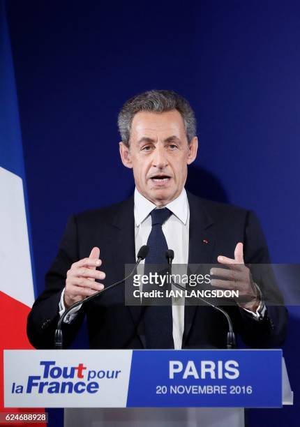 Former French President and candidate for the French right-wing presidential primary Nicolas Sarkozy delivers a speech at his campaign headquarters...