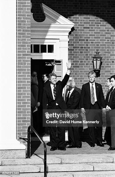 President-elect Bill Clinton waves to supporters as he tours Thomas Jefferson's home Monticello a few days before his inauguration. Clinton and his...