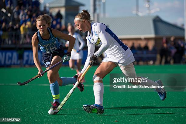 Lisa Giezeman of the University of Delaware races past Julia Young of the University of North Carolina during the Division I Women's Field Hockey...