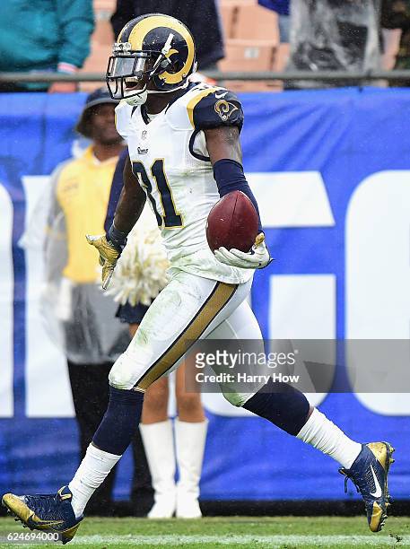 Maurice Alexander of the Los Angeles Rams celebrates his interception in the end zone against the Miami Dolphins during the third quarter of the game...