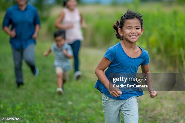 Chasing Toddler Riley 165 Mom Chasing Toddler Stock Photos, High-Res Pictures, and Images ...