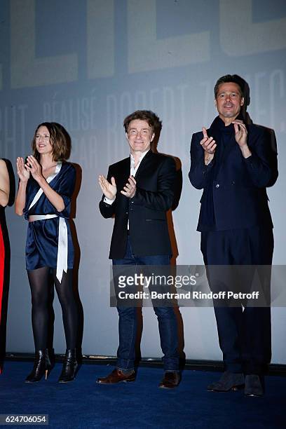 Actors Camille Cottin, Thierry Fremont and Brad Pitt present the "Allied - Allies"- Paris Premiere at Cinema UGC Normandie on November 20, 2016 in...