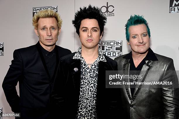 Musicians Mike Dirnt, Billie Joe Armstrong and Tre Cool of Green Day attend the 2016 American Music Awards at Microsoft Theater on November 20, 2016...