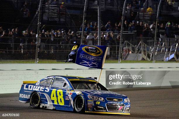 Jimmie Johnson, driver of the Lowe's Chevrolet, celebrates after winning the NASCAR Sprint Cup Series Ford EcoBoost 400 and the 2016 NASCAR Sprint...